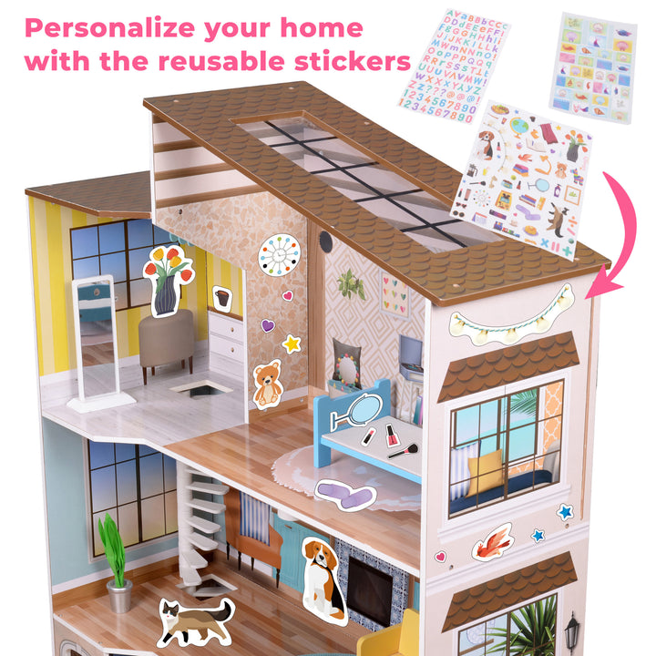 A view from above of the dollhouse with the sticker sheets with the caption "Personalize your home with the reusable stickers."