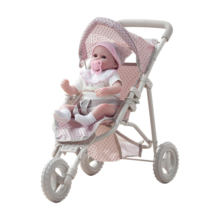 A view of the pink with gray polka dots baby doll jogging stroller with a baby doll sitting inside.