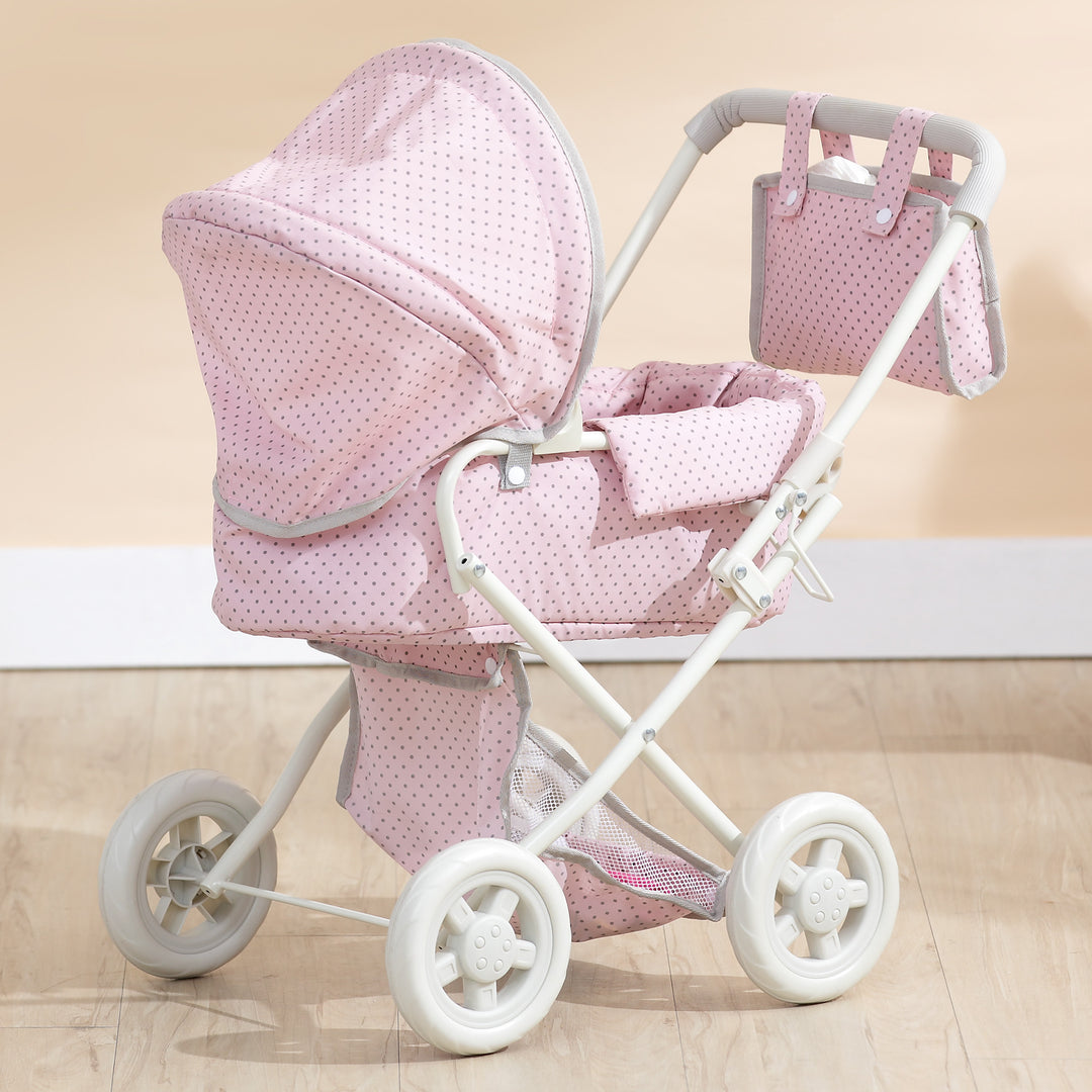 Olivia's Little World Polka Dots Princess Deluxe Baby Doll Stroller, Pink, with the storage bag hanging on the handle.