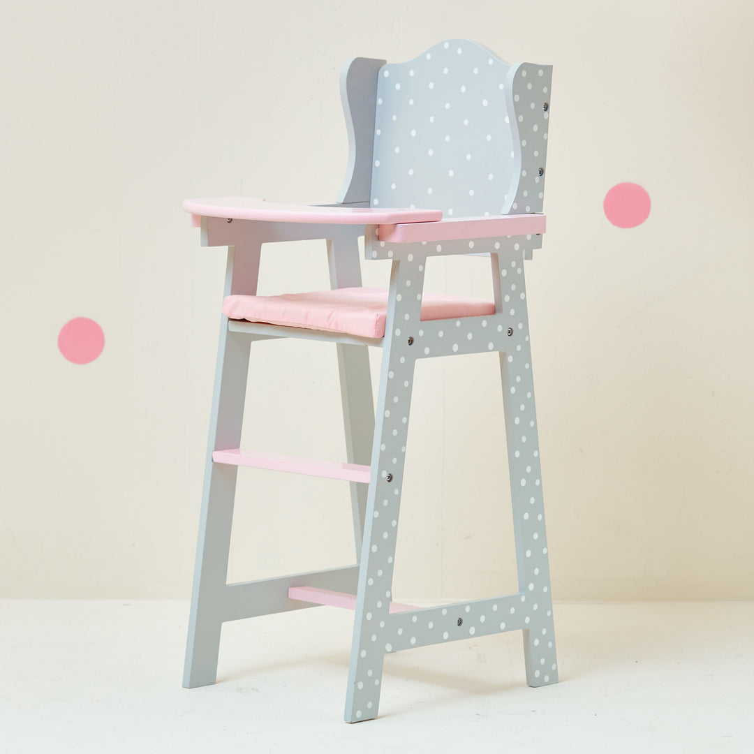 A pink and grey Olivia's Little World Polka Dots Princess Kids Baby Doll High Chair.