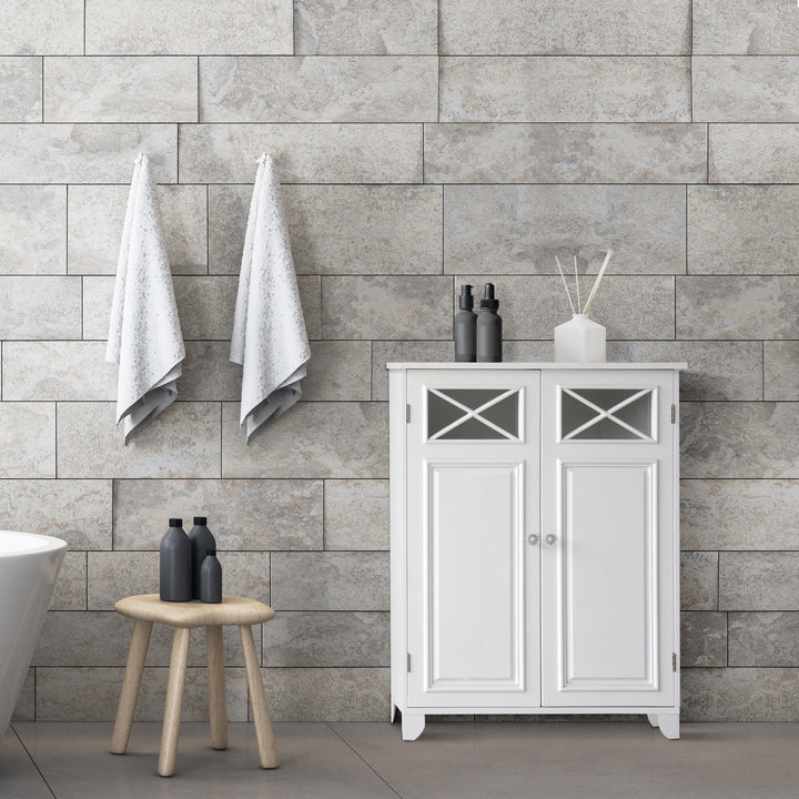 A bathroom with a white tub, a white Teamson Home Dawson Free Standing Floor Storage Cabinet.