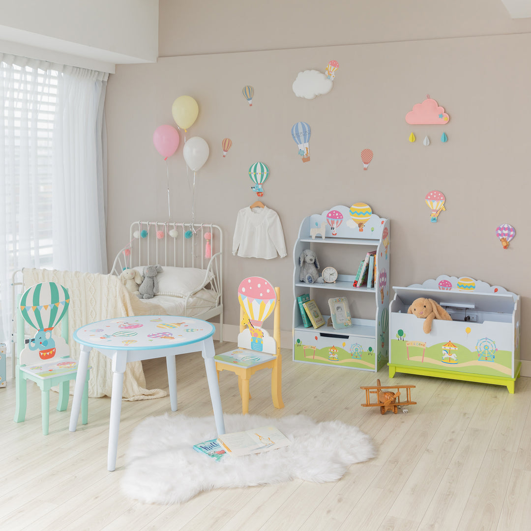 A children's room with Fantasy Fields Kids Peg Coat Hanger Hooks, Set of 3, Multicolor, organization bins, and balloons.
