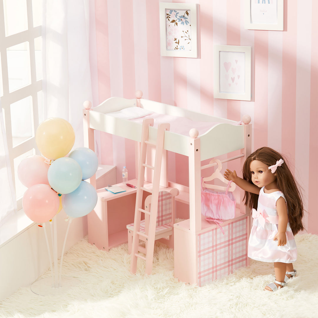 A picture of a 18" doll with a pink dress and brunette hair hanging clothes on a hanger on the rod of her pink and white loft bed.