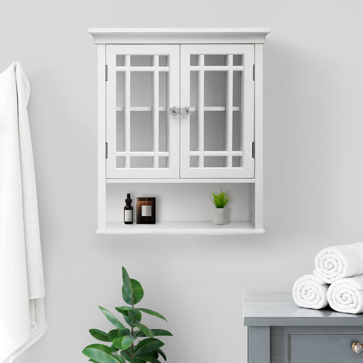 Teamson Home White Neal Removable Wall Cabinet with an open shelf in a bathroom with a potted plant below