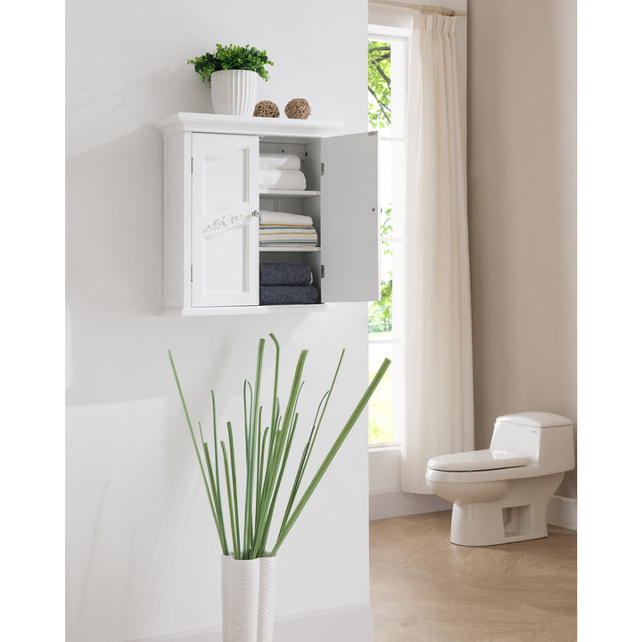 Teaamson Home White Versailles Removable Wall Cabinet with a door open with towels stored inside