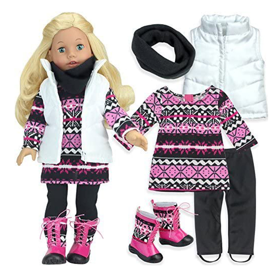 A blonde 18" doll with blue eyes dressed in a pink, black, and white fair isle tunic, black leggings, puffy white vest, black infinity scarf, and pink and black snow boots.