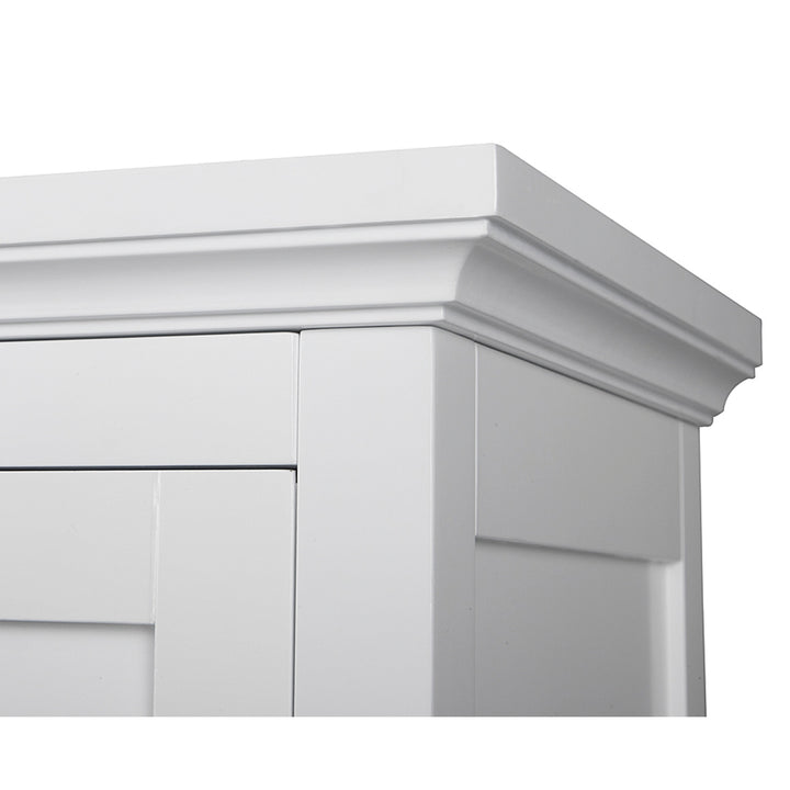 Close-up of a Teamson Home Glancy Wooden Corner Floor Cabinet with Shutter Door in White with crown molding.