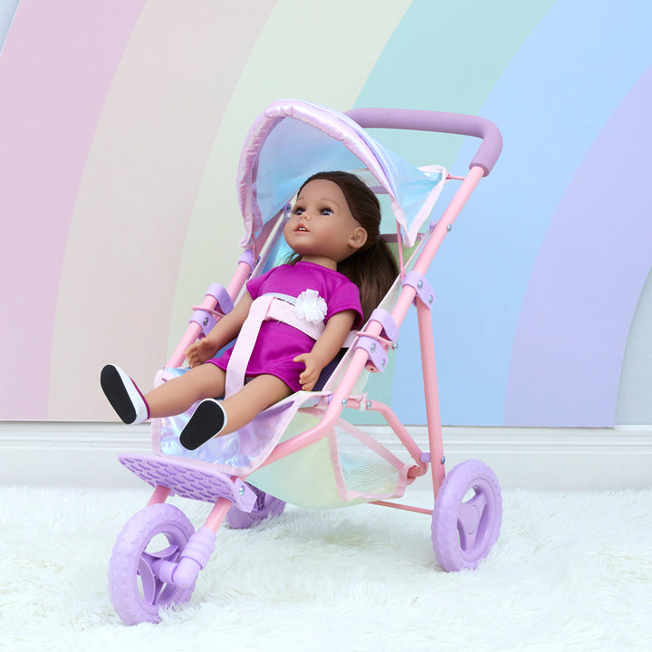 An 18" doll seated in an iridescent baby doll jogging stroller.