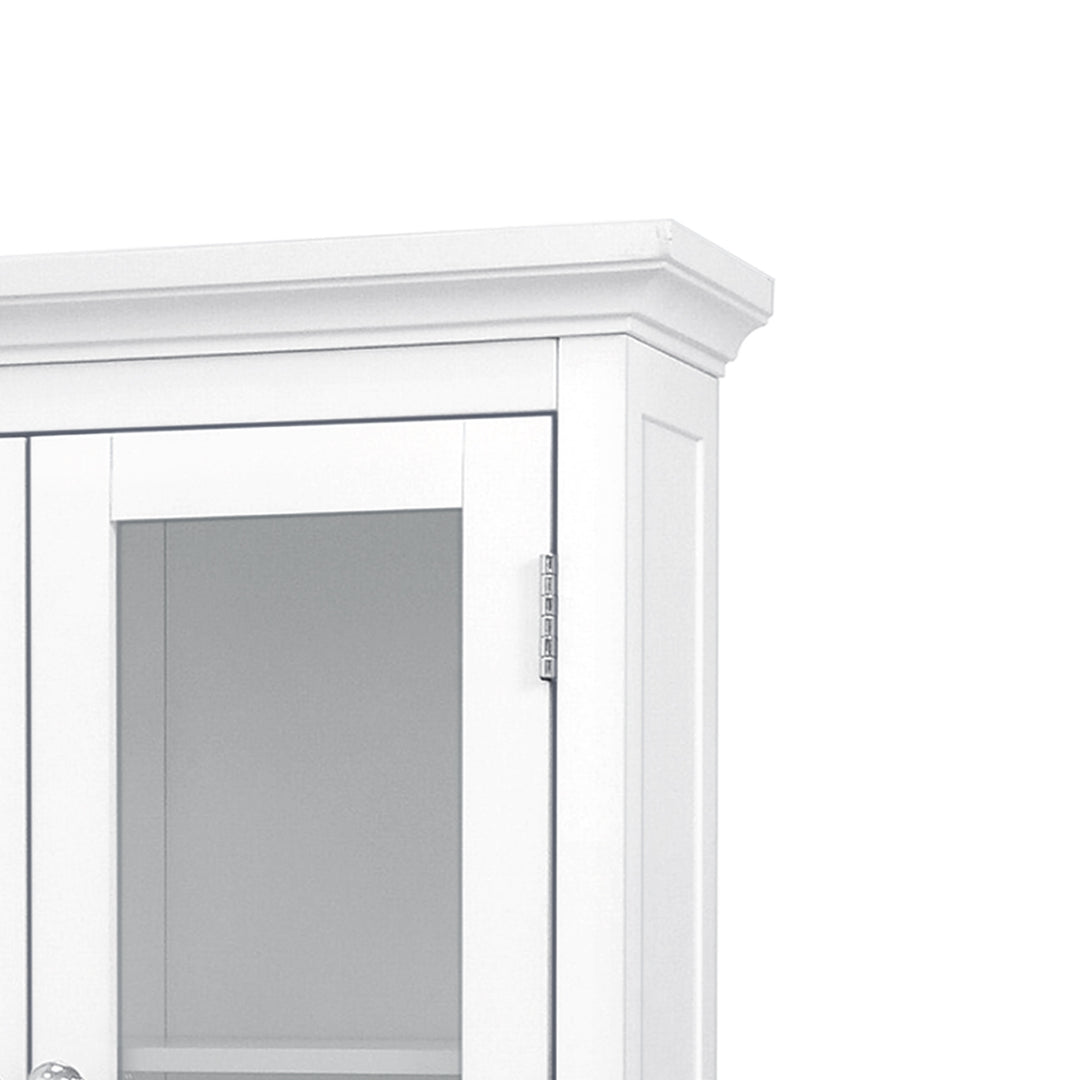 Close-up of the crown molding on the top of the Teamson Home White Madison Removable Wall Cabinet with 2 Doors