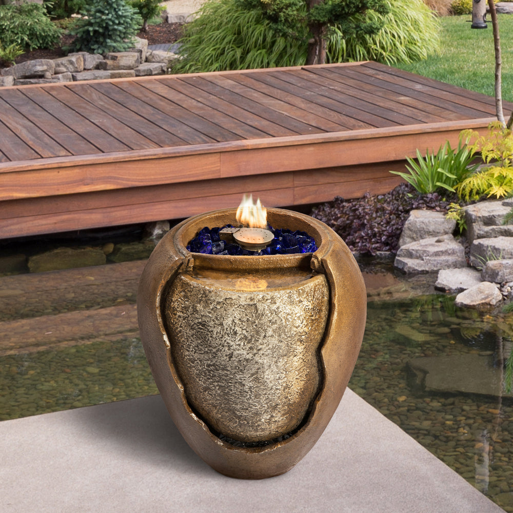 Teamson Home Large Outdoor Water Fountain Pot with Fire Pit feature, in an landscaped outdoor setting