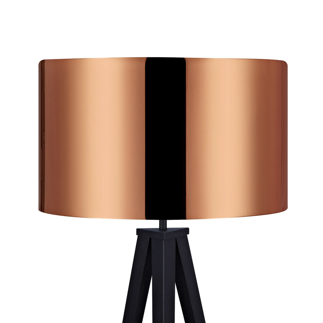 Close-up of copper drum shade of the tripod floor lamp