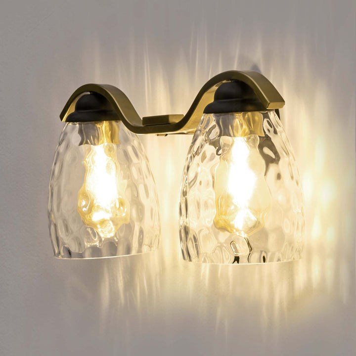 Clear Hammered Glass Cloche Shades illuminated by a cool LED bulb