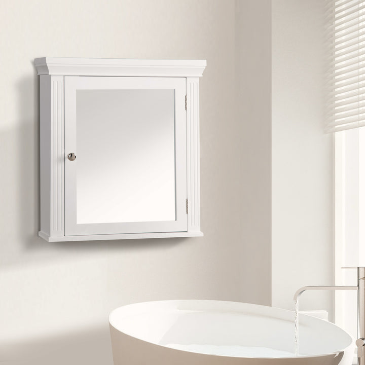 A White Teamson Home Removable Mirrored Medicine Cabinet with Crown Molded Top mounted on a white wall next to a modern white sink