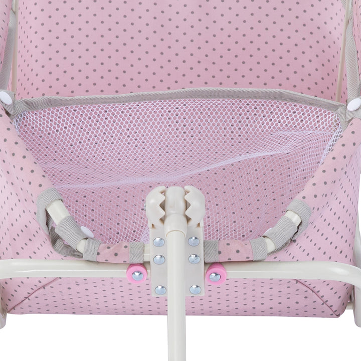 A pink with gray polka dots with a mesh panel baby doll wagon.