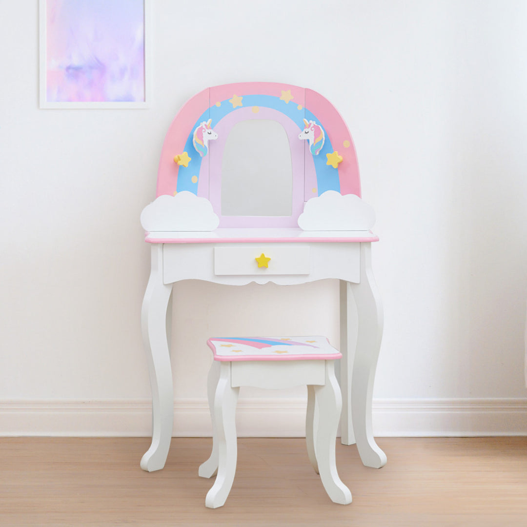 A Fantasy Fields Little Dreamer Rainbow Unicorn vanity table set with a mirror and stool from the FANTASY FIELDS collection.