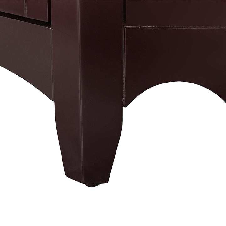 Close-up of a Teamson Home Glancy Wooden Corner Floor Cabinet leg with a floor protector.