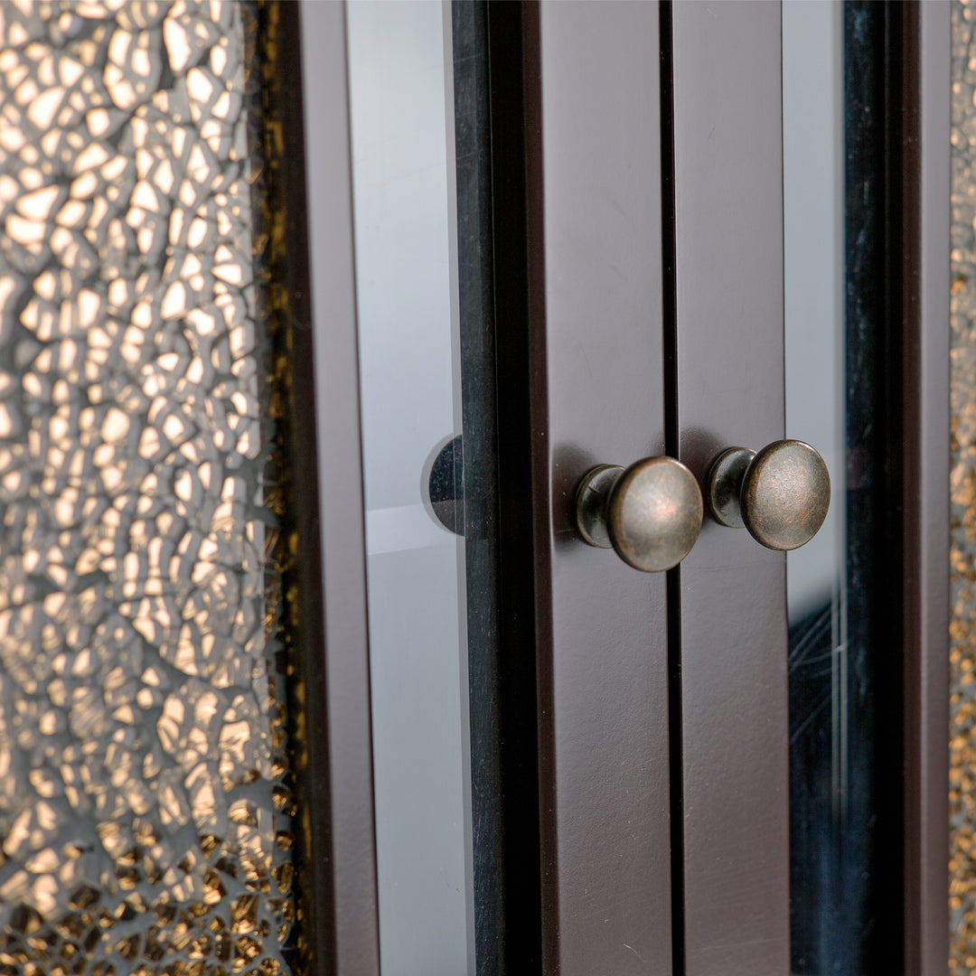 Close-up of the antique brass pull handles on the Teamson Home Dark Espresso Windsor Removable Wall Cabinet with Glass Mosaic Doors