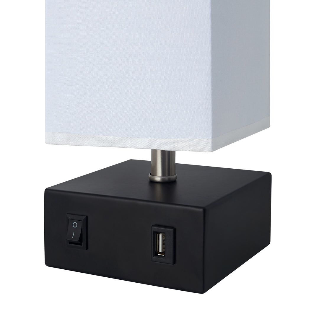 A close-up of the on/off button and USB port on the base of the lamp.