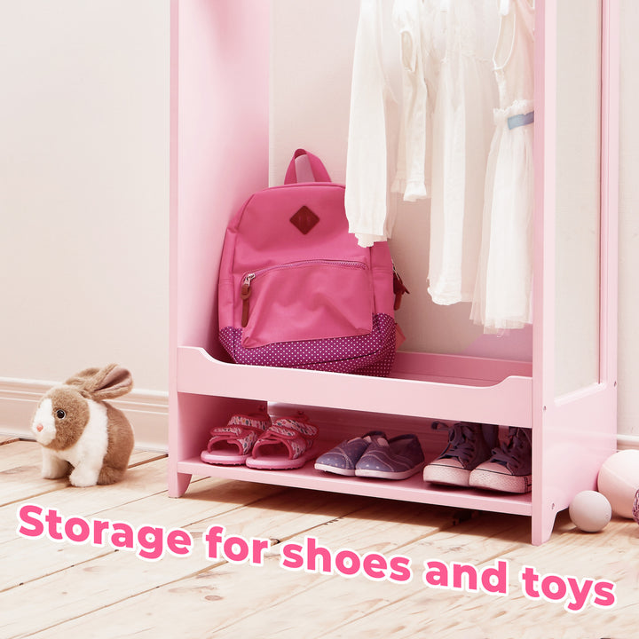 The bottom of a pink wardrobe focuses on a stuffed bunny, pink backpack and three pairs of shoes on the bottom shelf with a caption "Storage for shoes and toys".