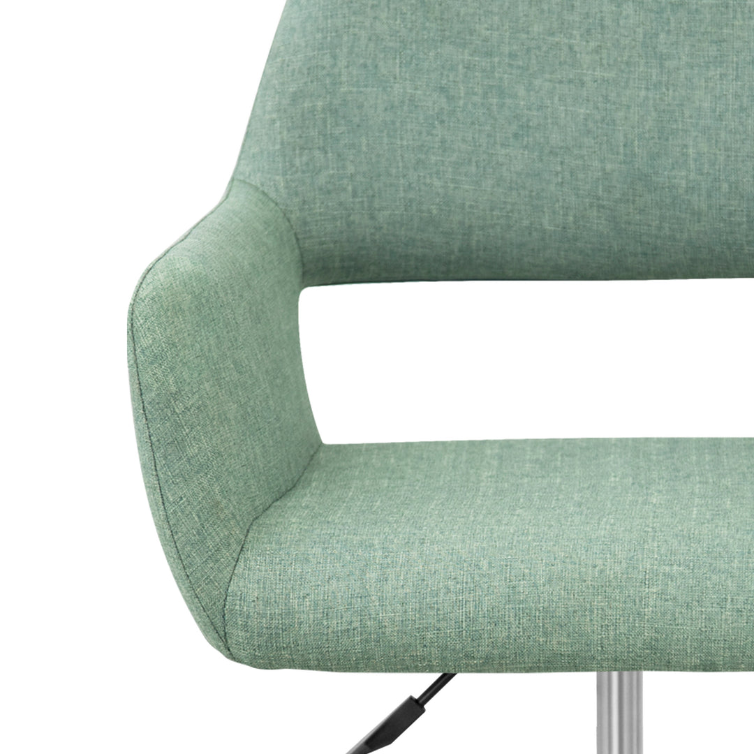 Close-up of the mint green fabric on an office chair