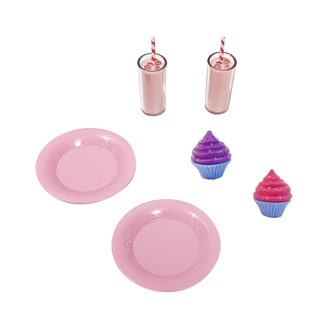 The accessories set includes two pink plates, two pink beverages, and two cupcakes, all sized for 18" dolls.