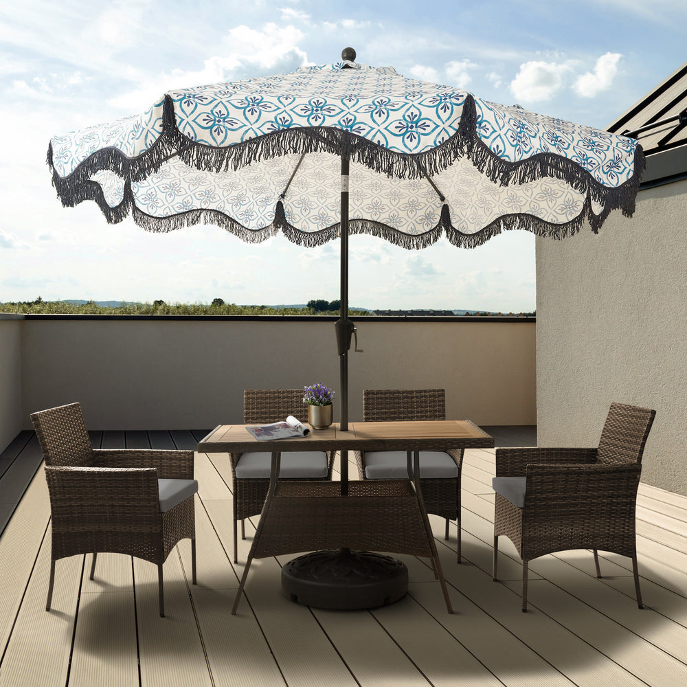 Teamson Home Outdoor Brown PE Rattan & Acacia 5-Piece Patio Dining Set with White Cushions under a separate umbrella on a deck with a beautiful view