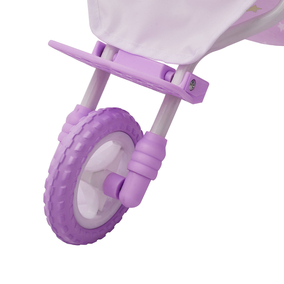 Close-up of a purple all-terrain wheel on  a purple with white stars baby doll jogging stroller with purple wheels and a white frame.