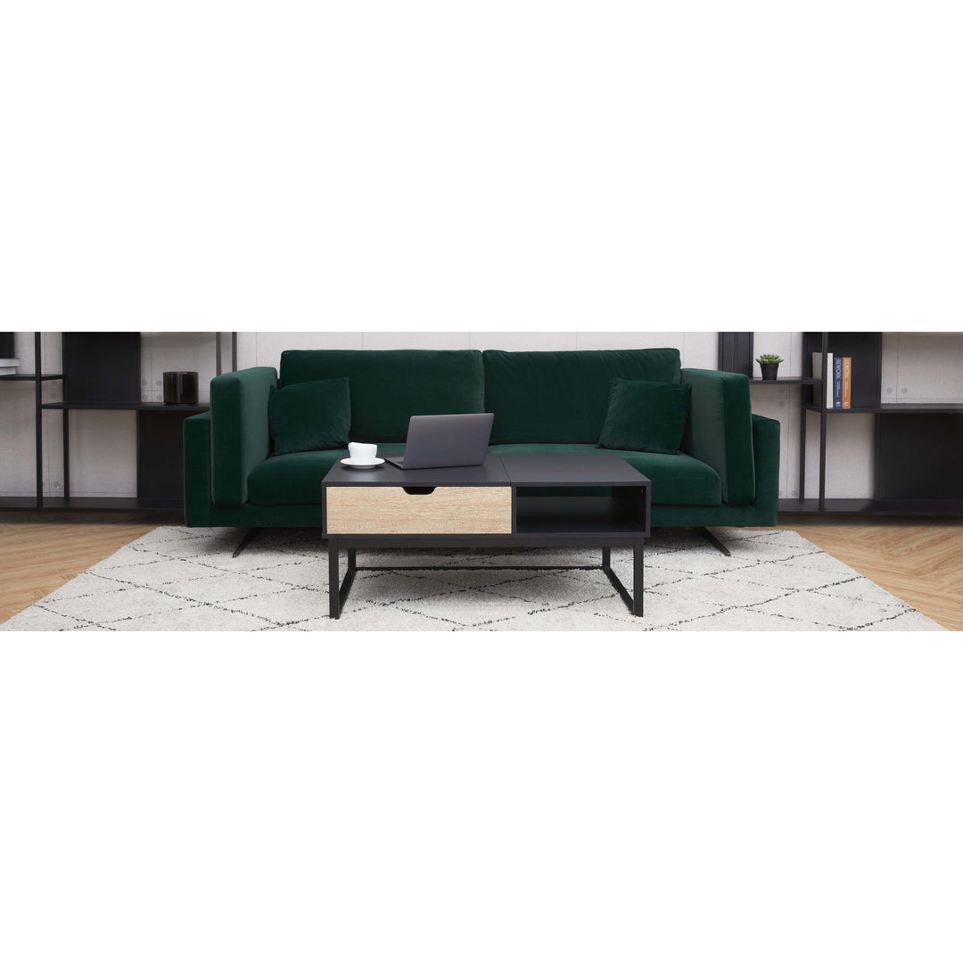 A living room with a green couch and a Teamson Home Bryson Two-Tone Lift Top Coffee Table Desk with Storage, Black.