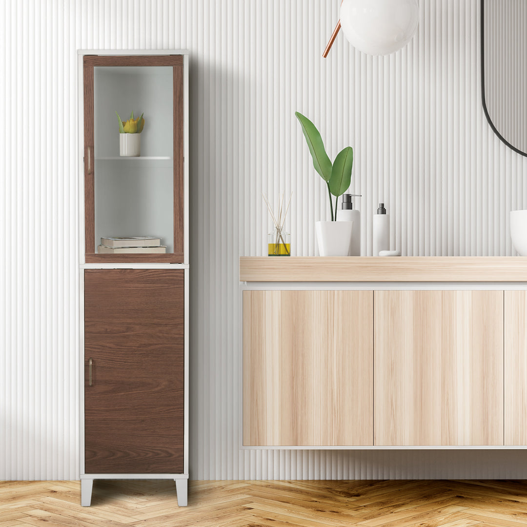 A Teamson Home Tyler Modern Linen Storage Cabinet with Two Doors, Walnut/White next to a modern bathroom counter