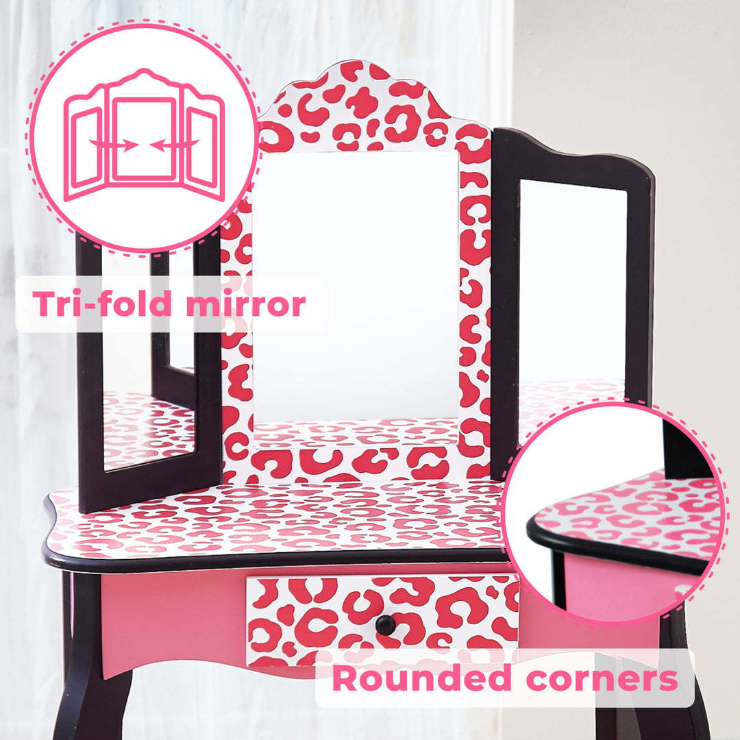 A pink and white Fantasy Fields Gisele Leopard Print Vanity Playset with a leopard print mirror.
