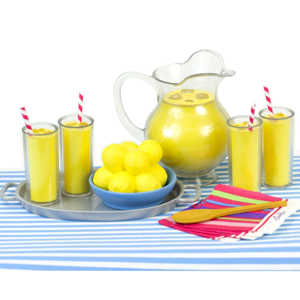 Sophia’s Fresh Lemonade Drink Set with Pitcher for 18" Dolls for kids with a pitcher of lemonade and glasses, along with a bowl of lemons and a bowl of straws.