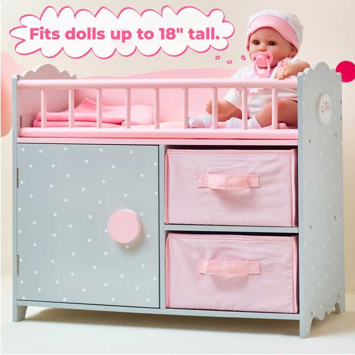 A picture of the crib with a baby doll sitting up in it and the caption "Fits dolls up to 18" tall."
