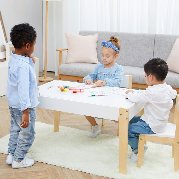 Three young kids play together with Teamson Kid's wooden food sets.