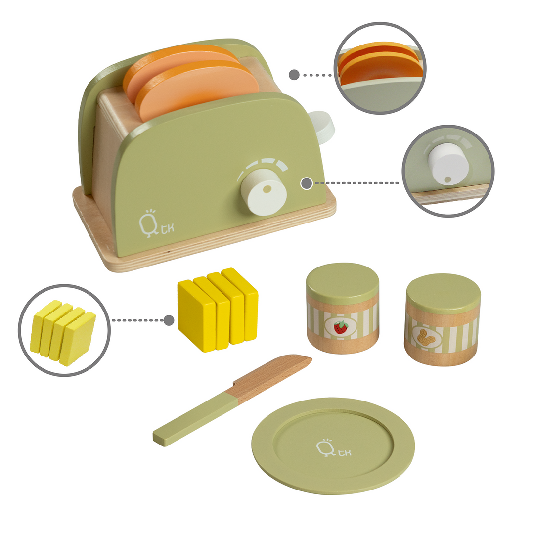 A Teamson Kids Little Chef Frankfurt Wooden Toaster play kitchen and utensils are shown for the play kitchen.