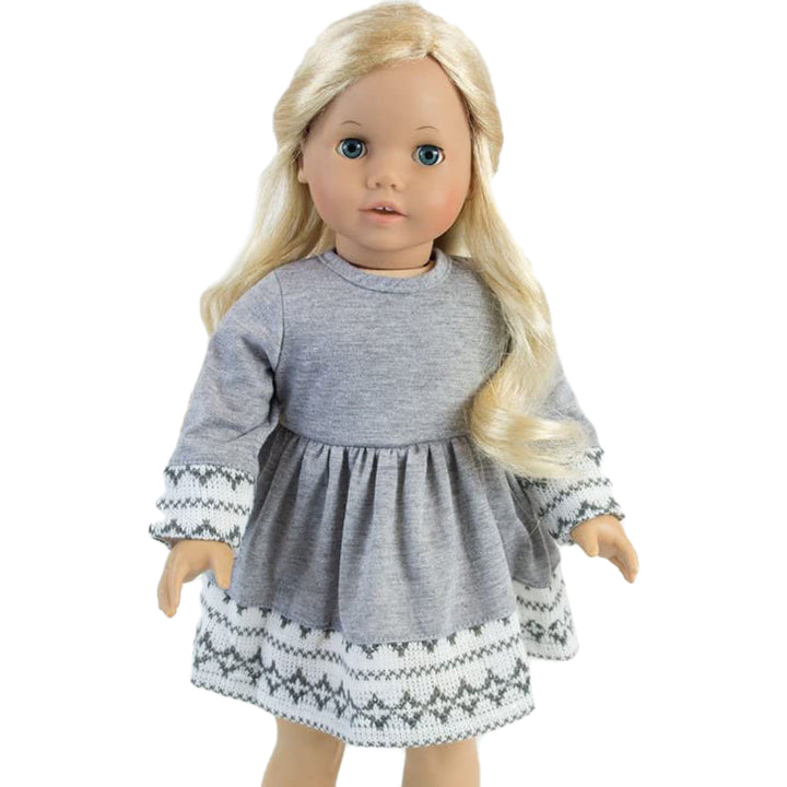 A blonde 18" doll with blue eyes and gray dress.