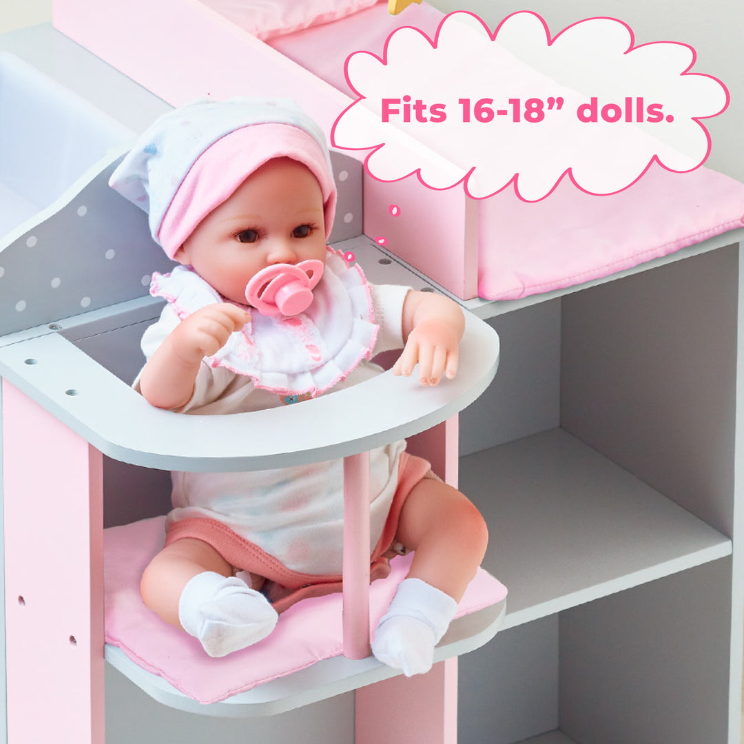 A Baby Doll Changing Station is sitting in a pink high chair with the caption "Fits 16-18" dolls."