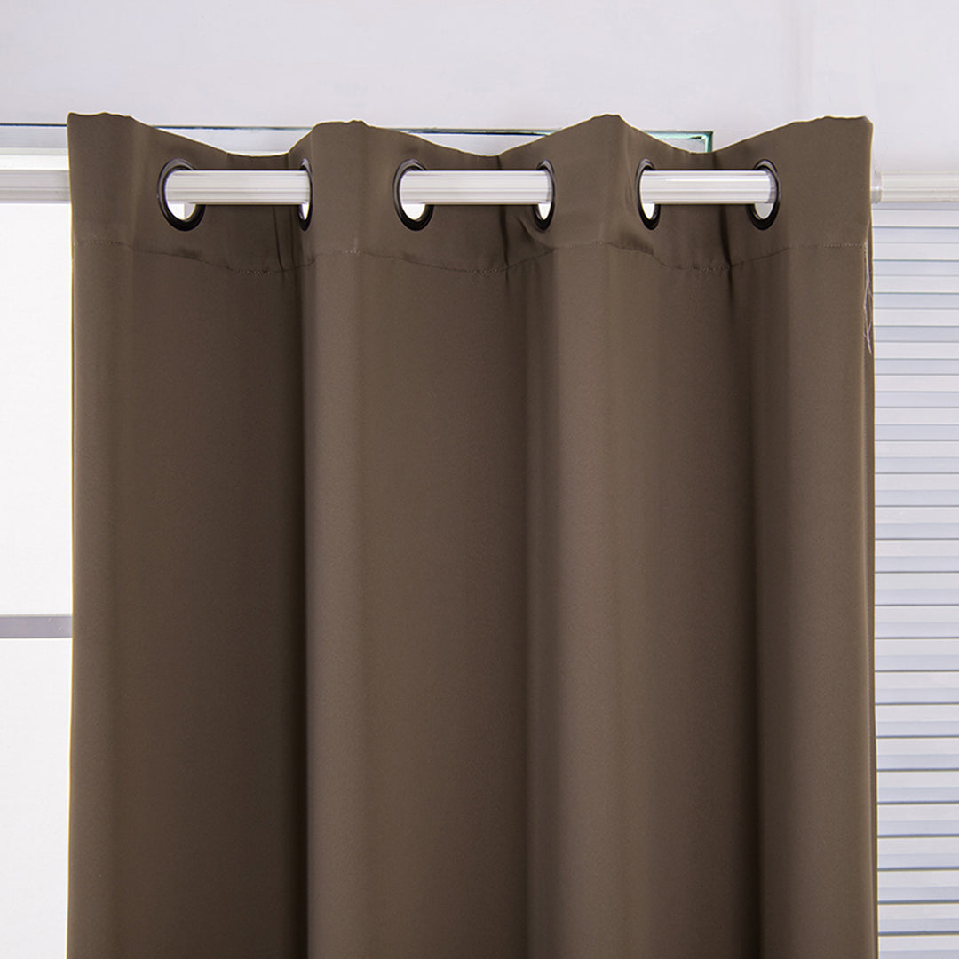 Close-up of a Teamson Home 63" Hazelnut Brown Edessa Premium Solid Insulated Thermal Blackout Window Curtain Panels with Grommets in front of a white blinds