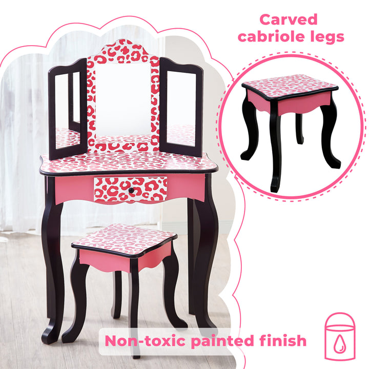 A pink and white Fantasy Fields Gisele Leopard Print Vanity Playset with a mirror.