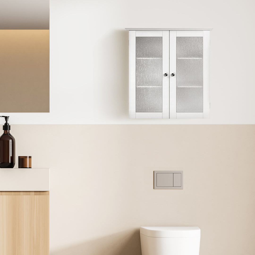 Teamson Home White Connor Removable Wall Cabinet with Water-Textured Glass mounted over a toilet in modern bathroom