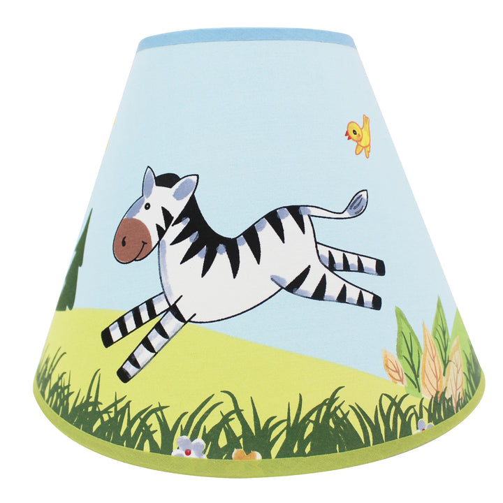 A playful Fantasy Fields Kids Sunny Safari Table Lamp, Multicolor with a zebra on it, perfect for a child's bedroom.