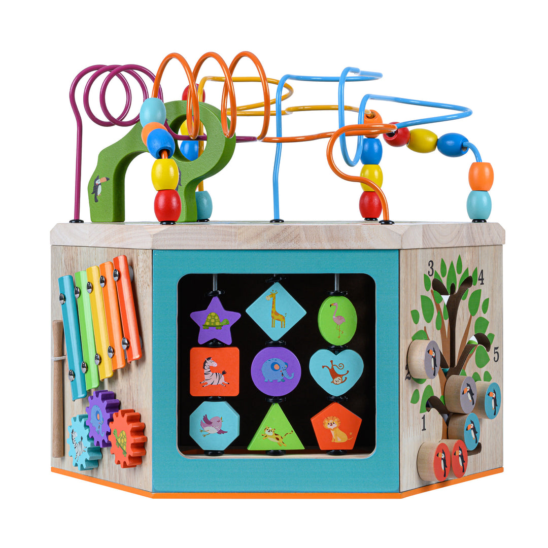 Teamson Kids Preschool Play Lab 7-in-1 Large Wooden Activity Station with a xylophone on the left, a series of tiles with animals to spin in the middle, and a slider shaped like a tree.
