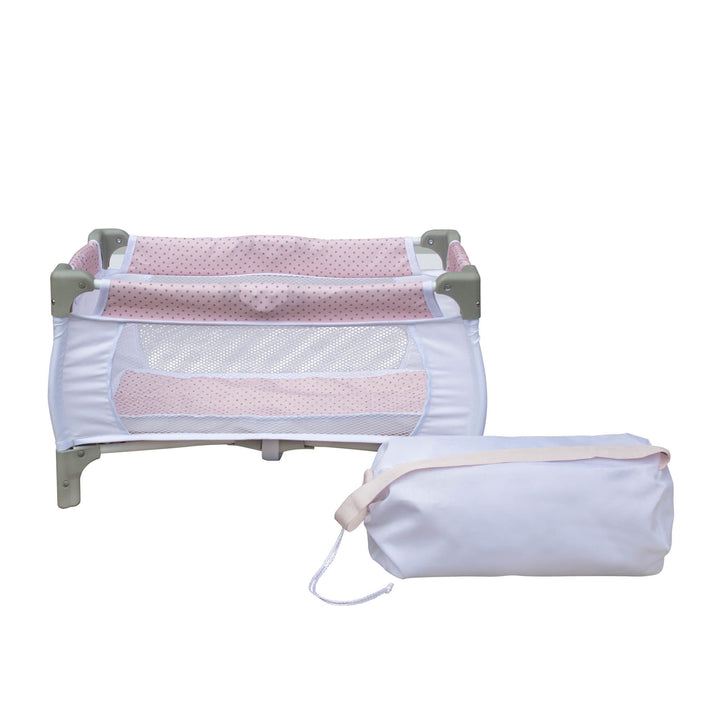 A foldable baby doll play pen with white drawstring bag to pack it into, Pink and White.