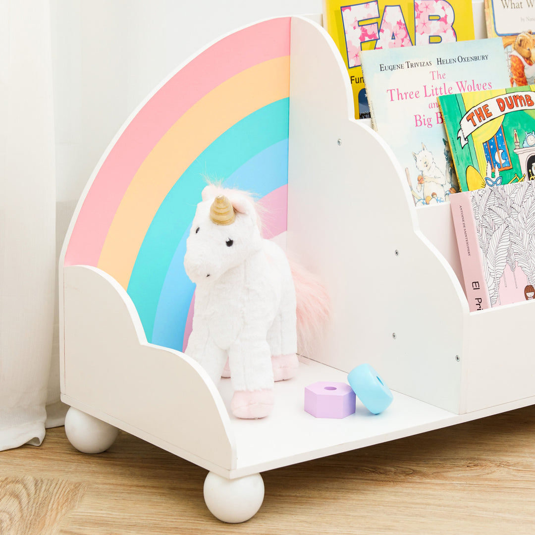 A Fantasy Fields Rainbow Wooden Display Bookcase, White with a unicorn on it, perfect for nursery storage.