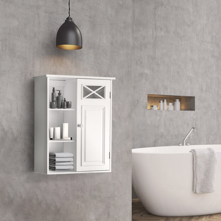 Teamson Home Dawson Removable Wooden Wall Cabinet with Cross Molding, White, hung on a gray wall in a modern bathroom with toiletries and towels on the open shelves