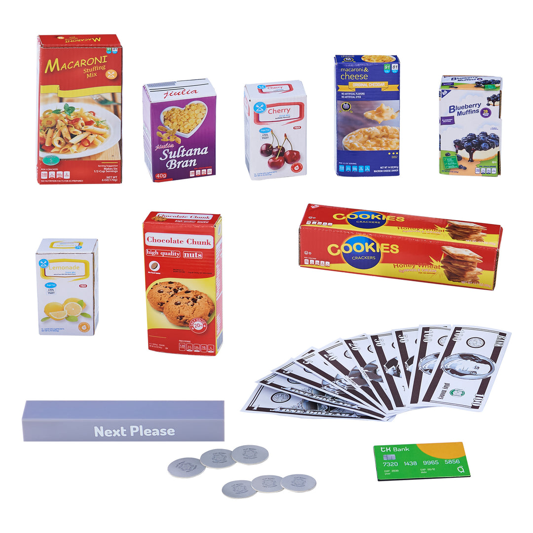 Variety of groceries on a white background with play money and a "next please" sign in front of a Teamson Kids Cashier Austin Play Market Checkout Counter with 26 Accessories, Green/Natural, simulating a grocery shopping and checkout scenario for kids.
