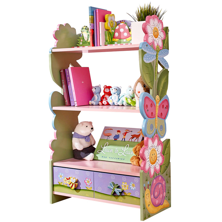A kids' Fantasy Fields Magic Garden wooden bookshelf with flowers and teddy bears.