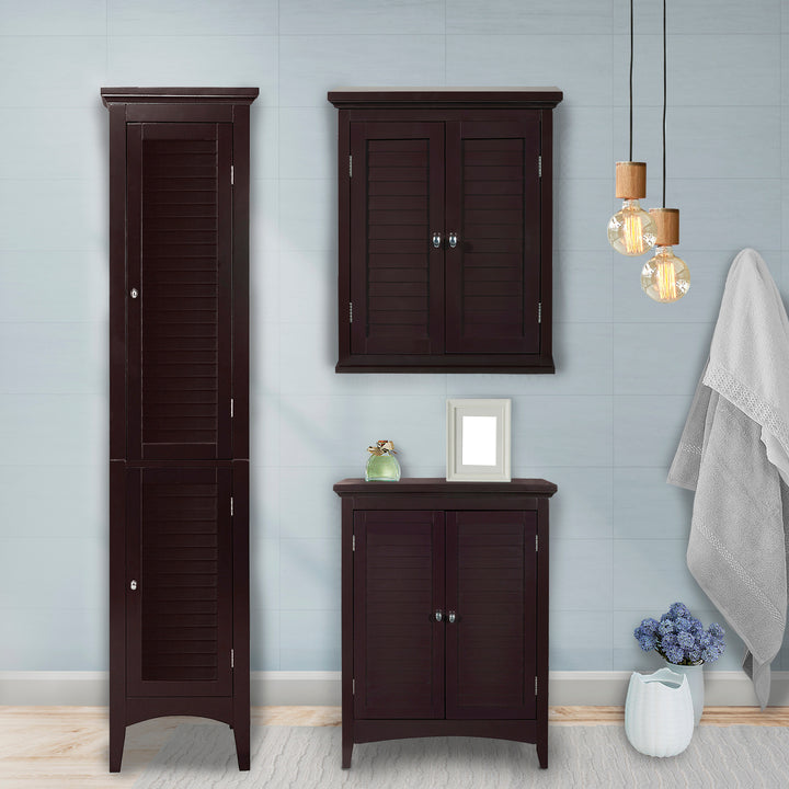 Modern bathroom space with A Dark Brown Teamson Home Glancy Linen Cabinet with louvred doors, next to a wall hung and freestanding floor cabinet