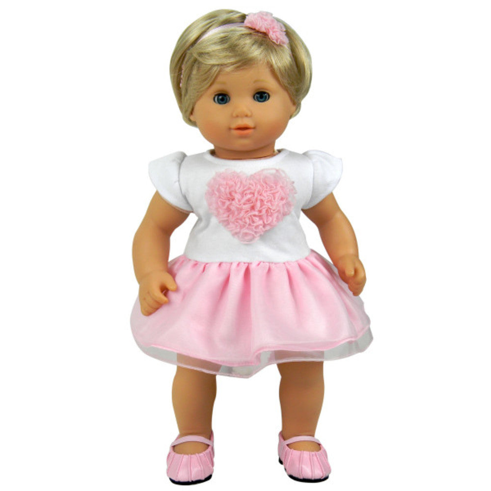A doll with blonde hair and Sophia's Heart Dress and Headband outfit.