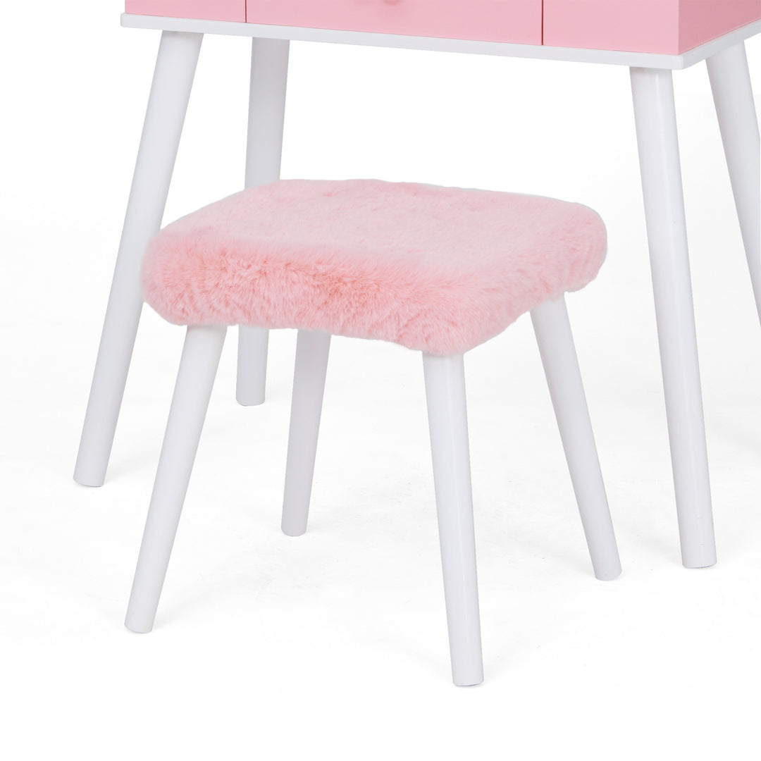 A close up of a white stool with a pink fur seat.