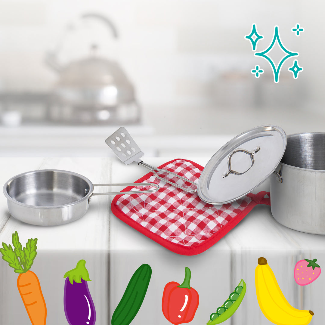 Clean and organized kitchen countertop with Teamson Kids 11 Piece Little Chef Frankfurt Stainless Steel Cooking Accessory Set and fresh vegetables illustrated along the bottom edge.
